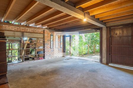 Garagem de casa à venda com 4 quartos, 390m² em Vila Nova, Porto Alegre