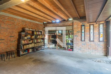 Garagem de casa à venda com 4 quartos, 390m² em Vila Nova, Porto Alegre