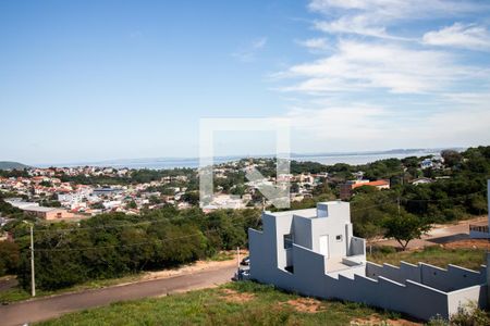 Vista de casa à venda com 3 quartos, 185m² em Campo Novo, Porto Alegre