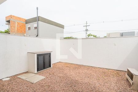Quintal de casa de condomínio à venda com 3 quartos, 115m² em Aberta dos Morros, Porto Alegre