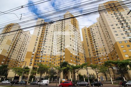 Fachada do condomínio de apartamento à venda com 2 quartos, 67m² em Santo Antônio, Porto Alegre