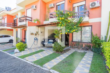 Fachada de casa de condomínio à venda com 3 quartos, 180m² em Tristeza, Porto Alegre