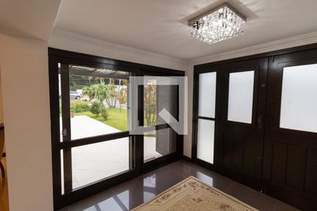 Hall de entrada de casa de condomínio à venda com 4 quartos, 455m² em Hípica, Porto Alegre