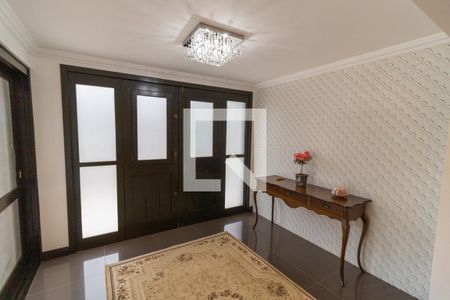 Hall de entrada de casa de condomínio à venda com 4 quartos, 455m² em Hípica, Porto Alegre