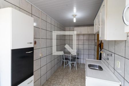 Cozinha e Área de Serviço de apartamento à venda com 3 quartos, 77m² em Vila Nova, Porto Alegre