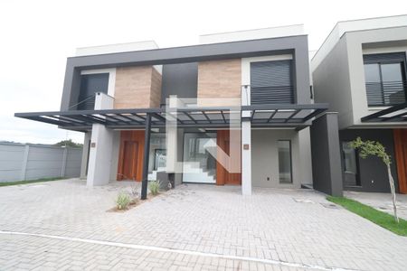 Fachada de casa de condomínio à venda com 3 quartos, 131m² em Operário, Novo Hamburgo