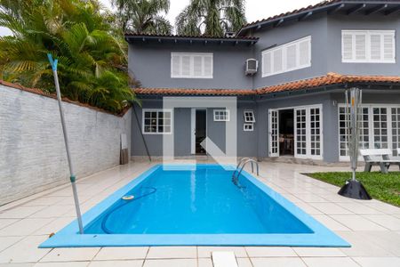 Piscina de casa à venda com 4 quartos, 306m² em Aberta dos Morros, Porto Alegre