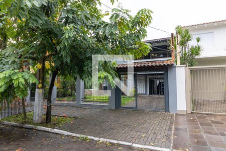 Fachada de casa à venda com 4 quartos, 306m² em Aberta dos Morros, Porto Alegre