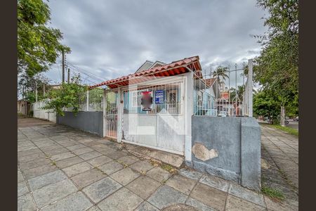 Fachada e Placa de casa à venda com 3 quartos, 300m² em Cristal, Porto Alegre