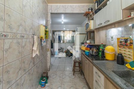 Cozinha e Área de Serviço de casa de condomínio à venda com 2 quartos, 40m² em Coronel Aparicio Borges, Porto Alegre