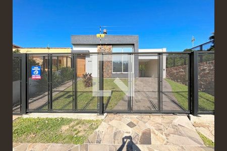 Fachada de casa à venda com 3 quartos, 155m² em Espírito Santo, Porto Alegre