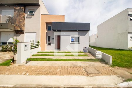 Fachada de casa à venda com 3 quartos, 110m² em Hípica, Porto Alegre