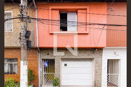 Fachada + Plaquinha de casa à venda com 2 quartos, 104m² em Bom Retiro, São Paulo