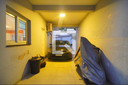 Garagem de casa de condomínio à venda com 3 quartos, 100m² em Rondônia, Novo Hamburgo