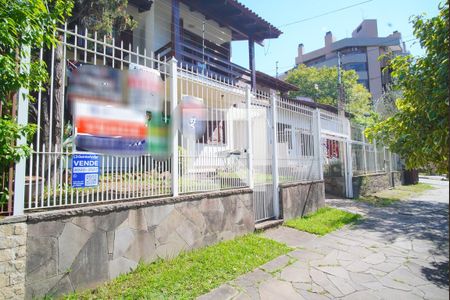 Fachada com Placa de casa à venda com 4 quartos, 313m² em Jardim Lindóia, Porto Alegre
