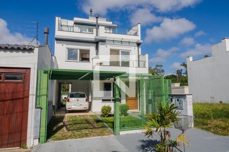 Fachada de casa à venda com 3 quartos, 178m² em Hípica, Porto Alegre