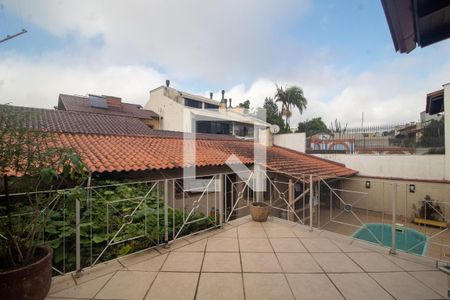 Varanda de casa à venda com 4 quartos, 394m² em Partenon, Porto Alegre