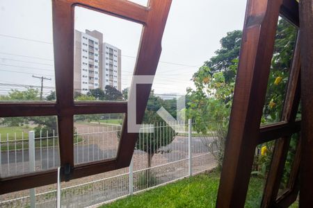 Vista de casa à venda com 4 quartos, 394m² em Partenon, Porto Alegre