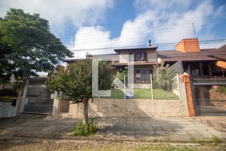 Fachada de casa à venda com 4 quartos, 394m² em Partenon, Porto Alegre