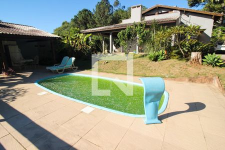 Piscina de casa à venda com 4 quartos, 400m² em Hípica, Porto Alegre