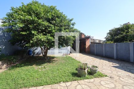 Área externa de casa à venda com 2 quartos, 165m² em Marechal Rondon, Canoas