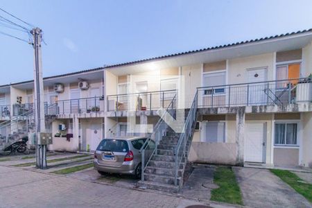 Fachada de casa de condomínio à venda com 2 quartos, 43m² em Hípica, Porto Alegre