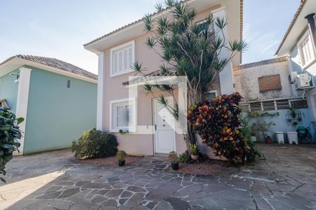 Fachada de casa de condomínio à venda com 3 quartos, 120m² em Tristeza, Porto Alegre