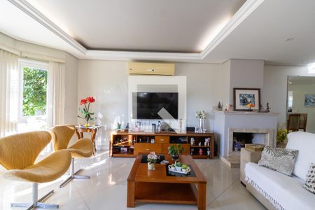 Sala de casa de condomínio à venda com 3 quartos, 400m² em Vila Nova, Porto Alegre