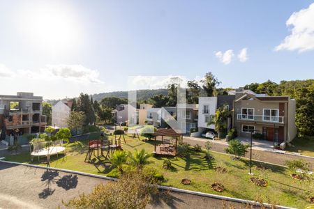 Vista da Suíte de casa de condomínio à venda com 3 quartos, 400m² em Vila Nova, Porto Alegre