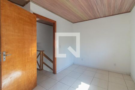 Quarto 1 de casa de condomínio para alugar com 2 quartos, 90m² em Vila Nova, Porto Alegre