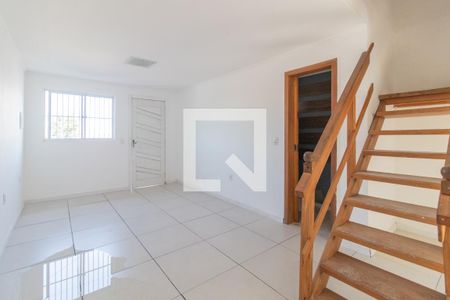 Sala de casa de condomínio para alugar com 2 quartos, 90m² em Vila Nova, Porto Alegre