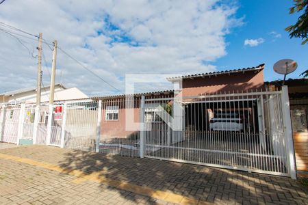 Fachada de casa à venda com 4 quartos, 200m² em Harmonia, Canoas