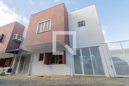 Fachada da residência de casa de condomínio à venda com 3 quartos, 117m² em Tristeza, Porto Alegre