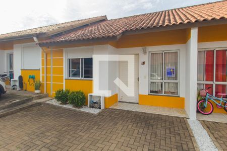 Fachada da casa de casa de condomínio para alugar com 2 quartos, 55m² em Olaria, Canoas