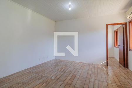 Sala de casa de condomínio para alugar com 1 quarto, 32m² em Vila Nova, Porto Alegre