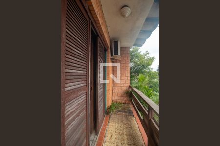 Varanda de casa à venda com 3 quartos, 136m² em Guarujá, Porto Alegre