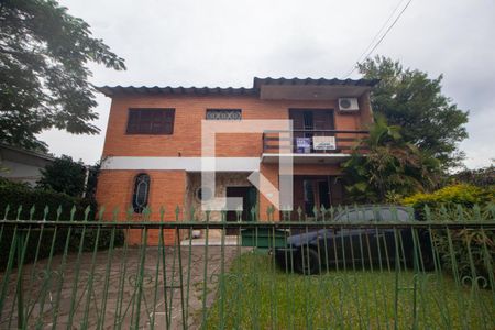 Fachada de casa à venda com 3 quartos, 136m² em Guarujá, Porto Alegre