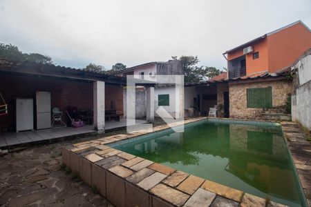 Área comum - Piscina/churrasqueira de casa à venda com 3 quartos, 136m² em Guarujá, Porto Alegre