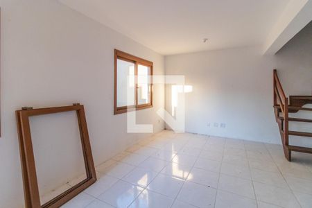 Sala de casa de condomínio à venda com 2 quartos, 130m² em Ipanema, Porto Alegre
