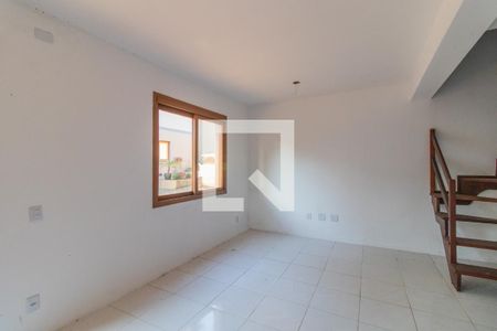 Sala de casa de condomínio à venda com 2 quartos, 130m² em Ipanema, Porto Alegre