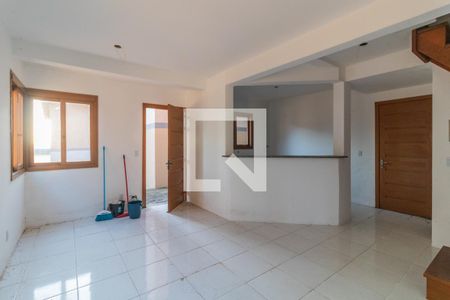 Sala de casa de condomínio à venda com 2 quartos, 130m² em Ipanema, Porto Alegre