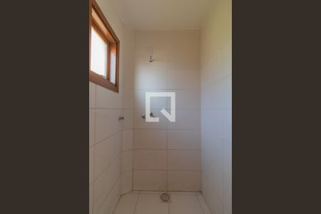 Banheiro de casa de condomínio à venda com 2 quartos, 130m² em Ipanema, Porto Alegre