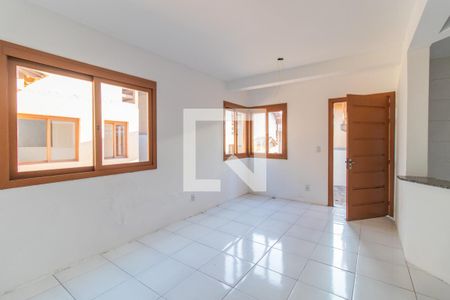 Sala de casa de condomínio à venda com 2 quartos, 130m² em Ipanema, Porto Alegre