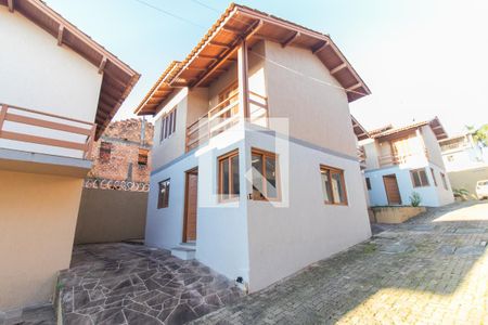 Fachada de casa de condomínio à venda com 2 quartos, 130m² em Ipanema, Porto Alegre
