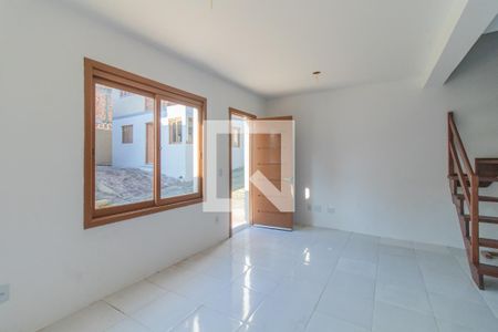 Sala de casa de condomínio à venda com 2 quartos, 130m² em Ipanema, Porto Alegre