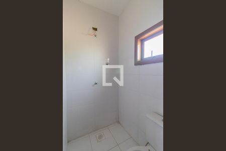 Banheiro de casa de condomínio à venda com 2 quartos, 130m² em Ipanema, Porto Alegre
