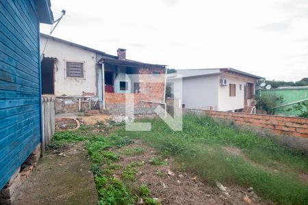 Quintal de casa à venda com 4 quartos, 390m² em Vila Nova, Porto Alegre