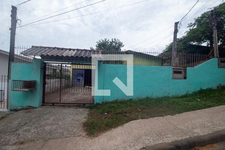 Fachada de casa à venda com 4 quartos, 390m² em Vila Nova, Porto Alegre