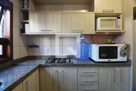 Cozinha de casa de condomínio à venda com 2 quartos, 82m² em Niterói, Canoas