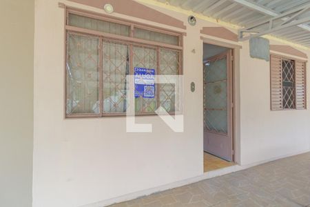 Fachada e Placa de casa de condomínio à venda com 2 quartos, 55m² em Igara, Canoas